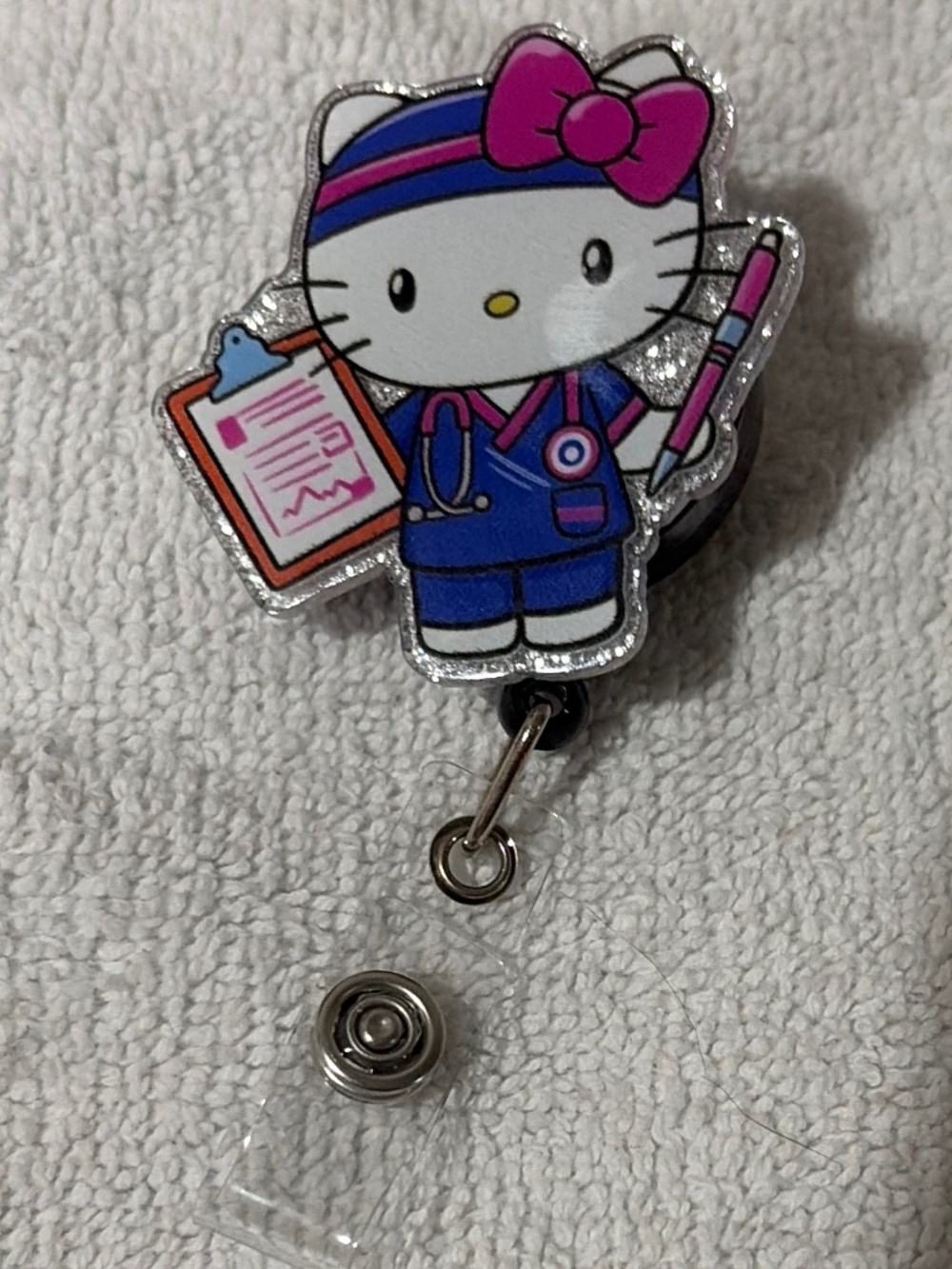 Hello Kitty badge reel